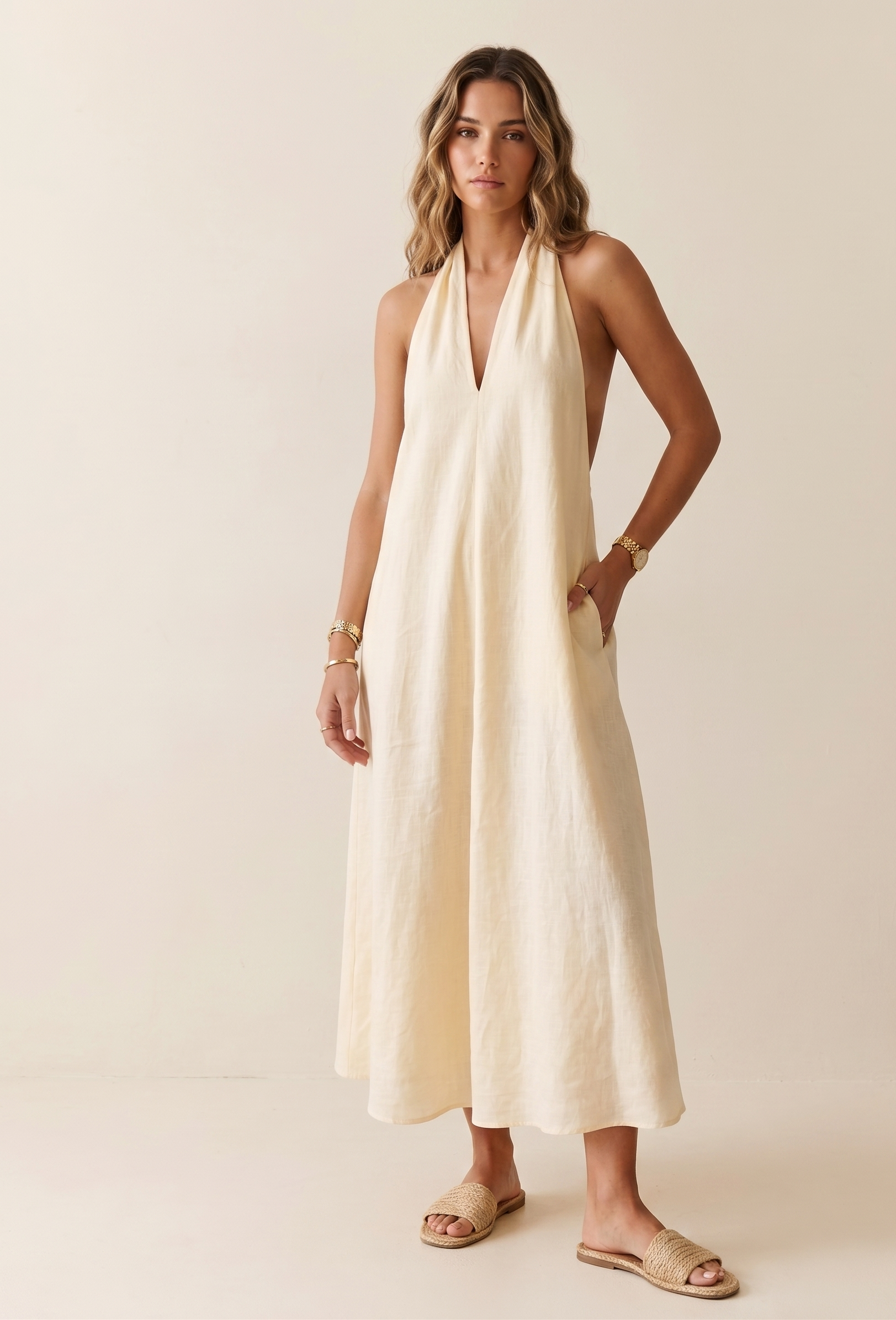 Feletin Luxe Halter V-Neck Pocketed Midi Dress in Yellow